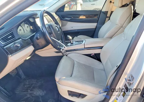 2012 BMW 750 Li z USA, uszkodzony, nr VIN WBAKB8C52CDW84780